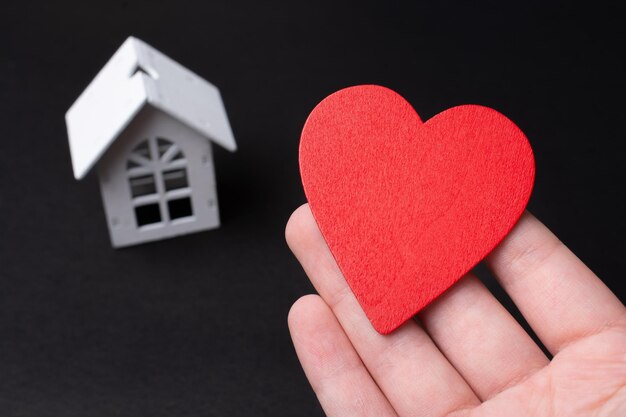 House with a red wooden heart Valentine's day house Home Sweet Home life insurance