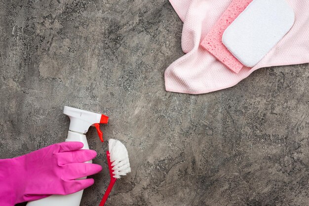 Photo household accessories lying on a background of gray decorative plaster copy the space