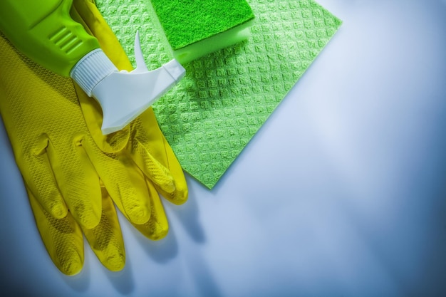 Household washcloth sponge sprayer safety gloves on white background