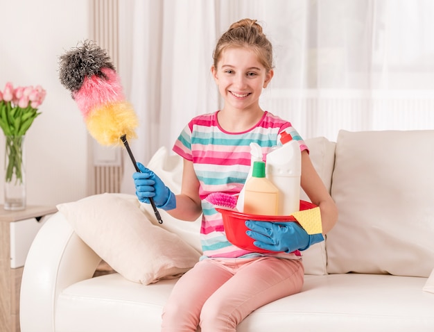 Housekeeper with kit for cleaning