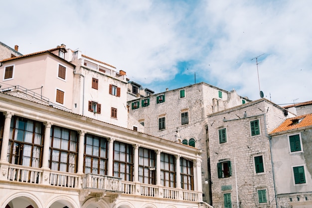 Houses around the basilica of st james in sibenik croatia against a blue sky