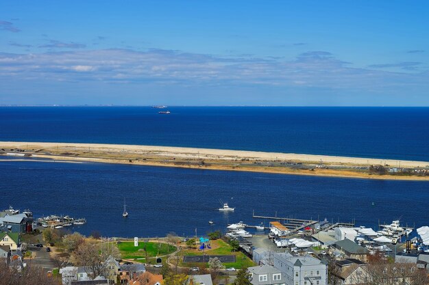 Houses and Atlantic Ocean shore viewed from the light house at Sandy Hook. Sandy Hook is in New Jersey, USA