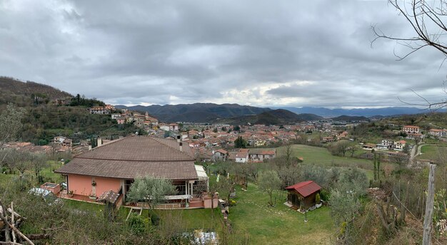 Houses and buildings against sky