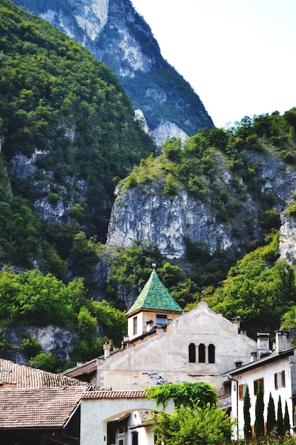 Houses by rocky cliff