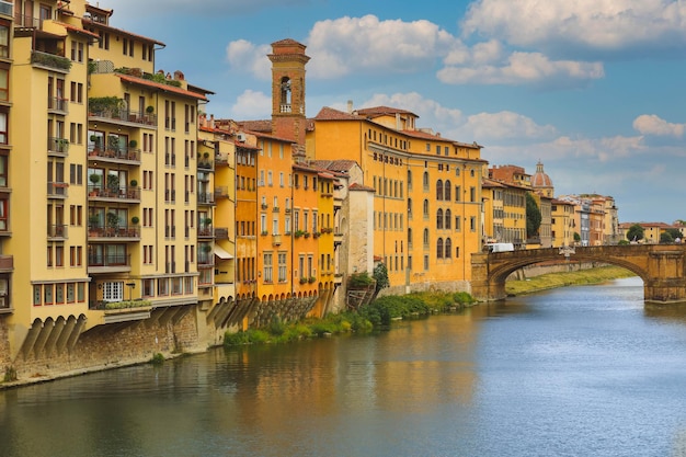 Houses and Carraia bridge on Arno river Florence Italy