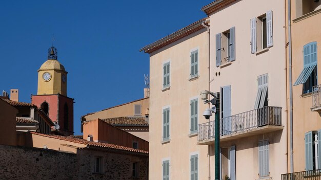 Photo houses and clock tower in saint-tropez france