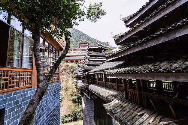 Houses and Dong people style bridge in Jiangdi