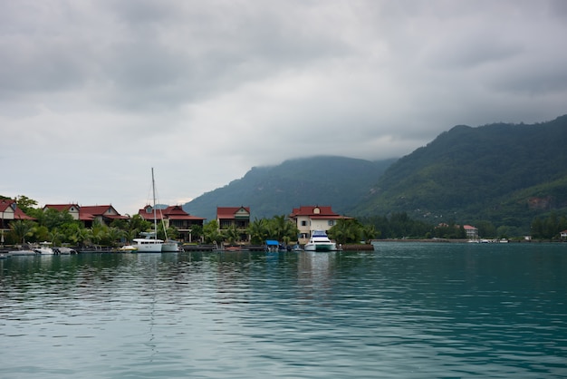 Houses near the sea with cloudy day