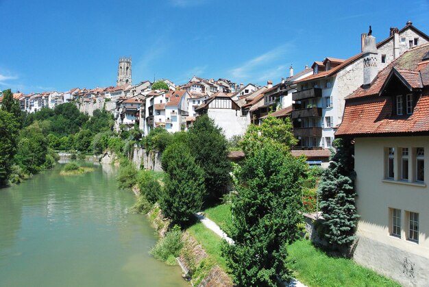 Houses in town against sky