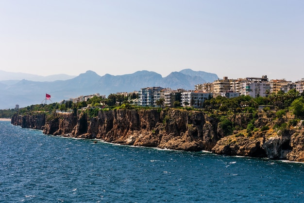 Houses and villas on a cliff on the shores of the middle earth sea in antalya, turkey