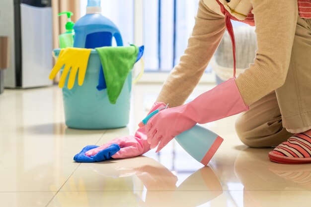 The housewife cleans the house carefully