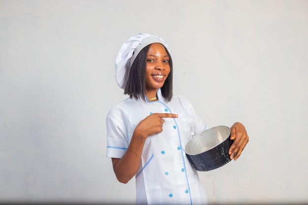 Housewife female chef cook or baker in striped apron