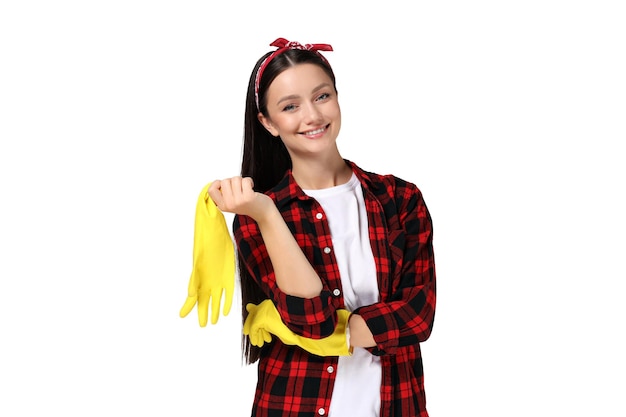 Housewife girl with means for cleaning the house on a gray background