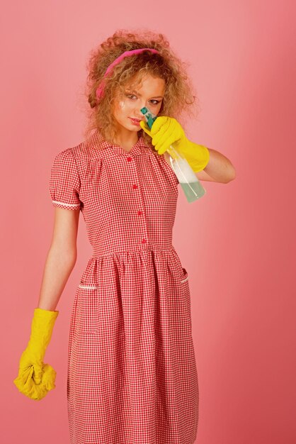 Housewife hold spray bottle with rubber gloves Housewife ready to clean up Women love cleaning