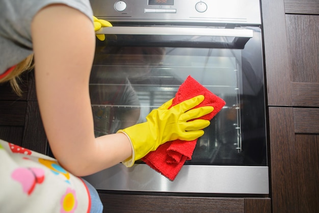 Housework and housekeeping concept close up of woman hand in p