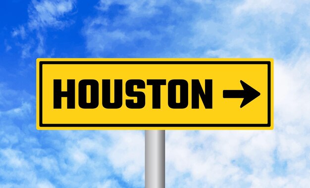 Houston road sign on sky background