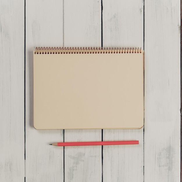 Foto houten bureaulijst met notitieboekje