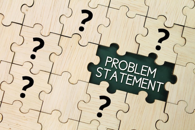 Foto houten puzzel en vraagteken met het woord probleemstelling problem statement concept