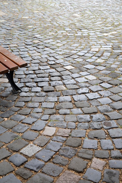 Houten Zetel op Geplaveide Achtergrond