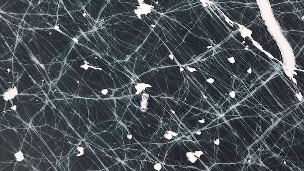 Hovercraft on the ice of lake baikal in winter time clip aerial view of the air cushion vehicle on