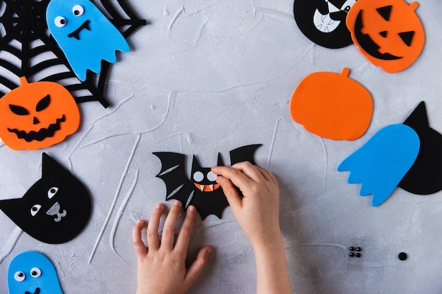 How to make decore for halloween greetings and fun children art\
project diy concept step by step photo instruction step 4 glued\
eyes