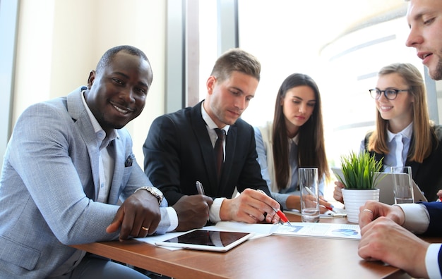 Http://www.dreamstime.com/royalty-free-stock-photography-group-business-people-meeting-background-office-image85832777