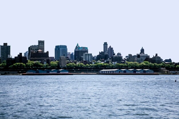 Photo hudson river by buildings in city against sky