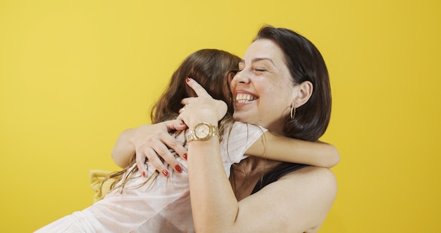 Hug of mother and daughter.