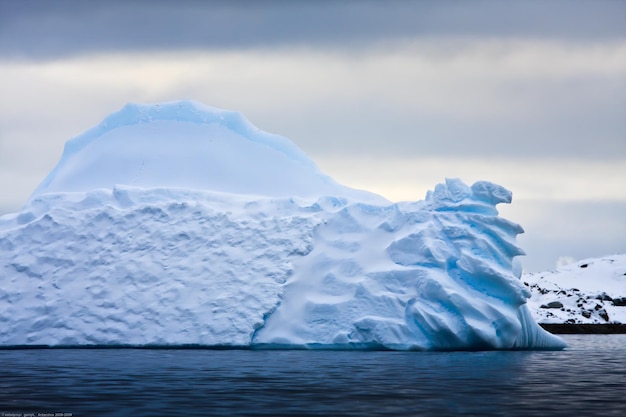 Huge antarctic iceberg in the snow