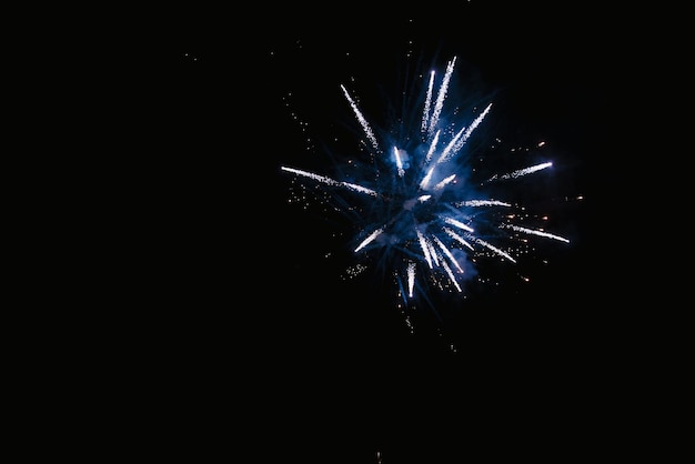 Huge fireworks explosion In front of the black night sky