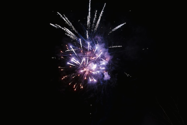 Huge fireworks explosion In front of the black night sky