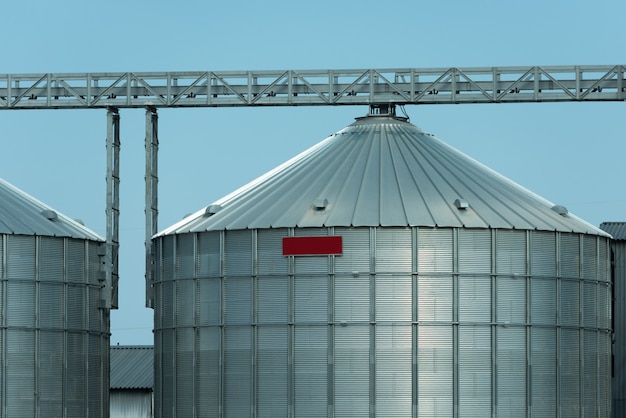 Photo huge metal grain storage containers