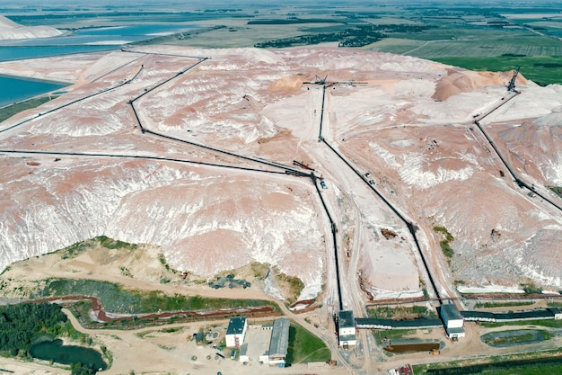 A huge mound of potassium salt Warehousing of rocks with the help of a spreader