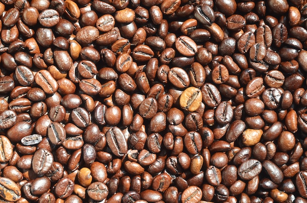 huge number of fragrant and fresh brown roasted coffee grains