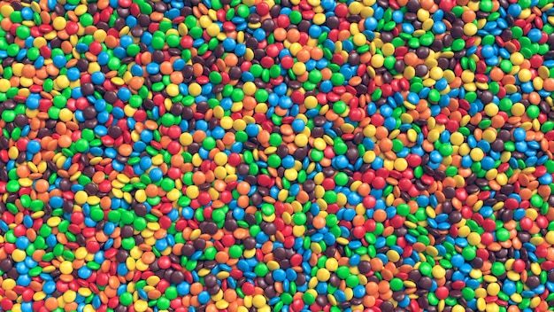 Huge pile of colorful coated chocolate candies background