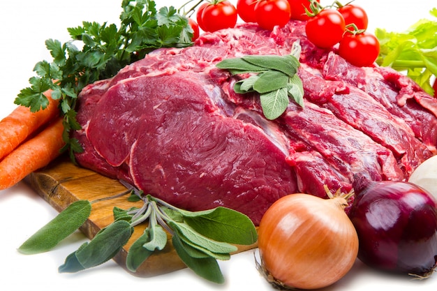 Huge red meat chunk with vegetables