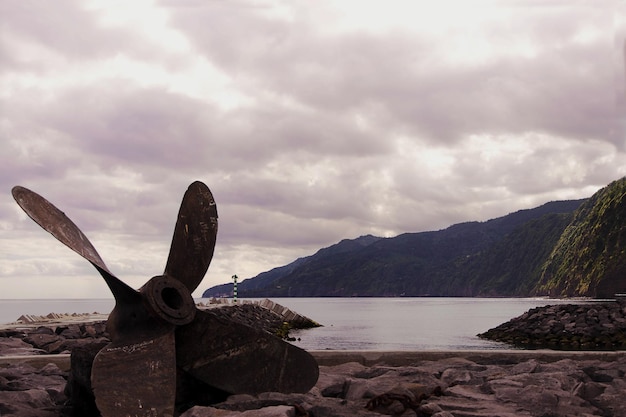 A huge screw of a ship on the shore