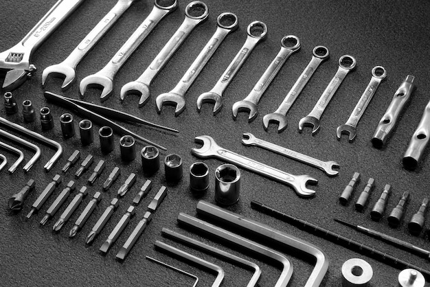 Huge set of universal mechanics hand tools laid out in order