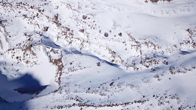 A huge wall of ice glacier in the mountains