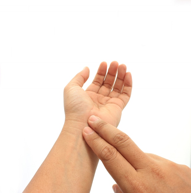 Human hand checking himself the pulse