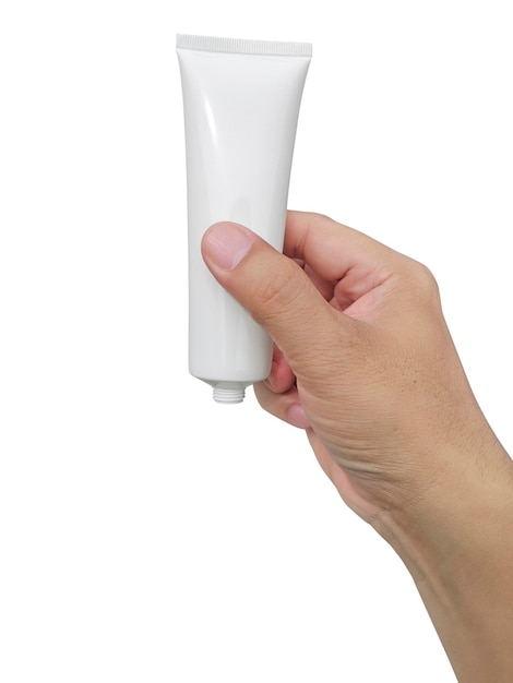 Фото Человеческая рука держит косметическую пластиковую трубку на белом фоне