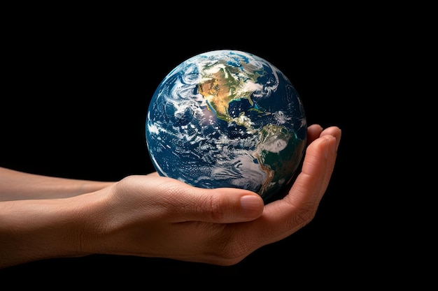 human hand holding the planet earth black background