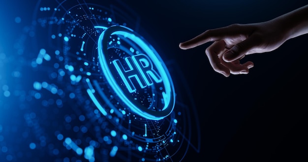 Photo human hand touching futuristic virtual screen with hr icon human resources management recruitment employment headhunting concept