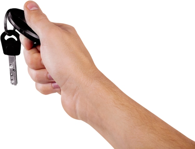 Human Hand with Car Key and Remove Control - Isolated