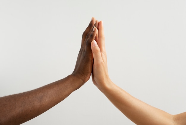 Photo human hands against white background