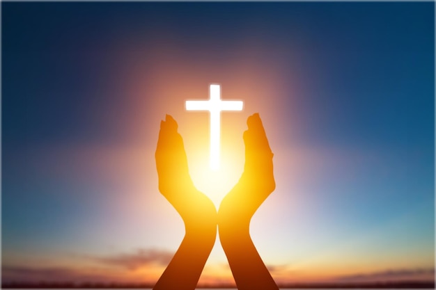 Human hands open palm and cross. Christian Religion concept background.