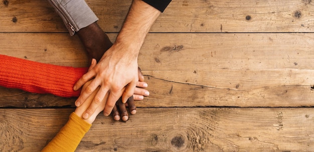 Human hands together holding together, with copyspace for your individual text.