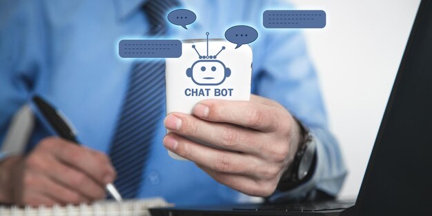 Human holding smartphone with Chat Bot application for online information Artificial Intelligence concept