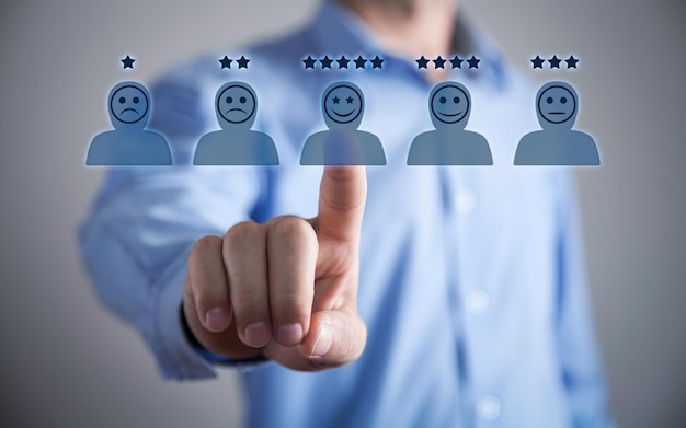 Photo human icons with positive and sad face stars customer evaluation and satisfaction