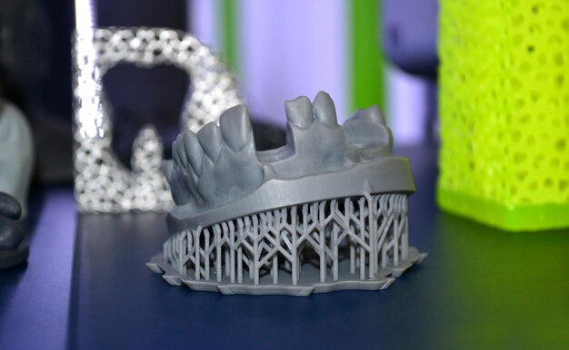 Photo human lower jaw printed on d printer of photopolymer stereolithography d printer of liquid